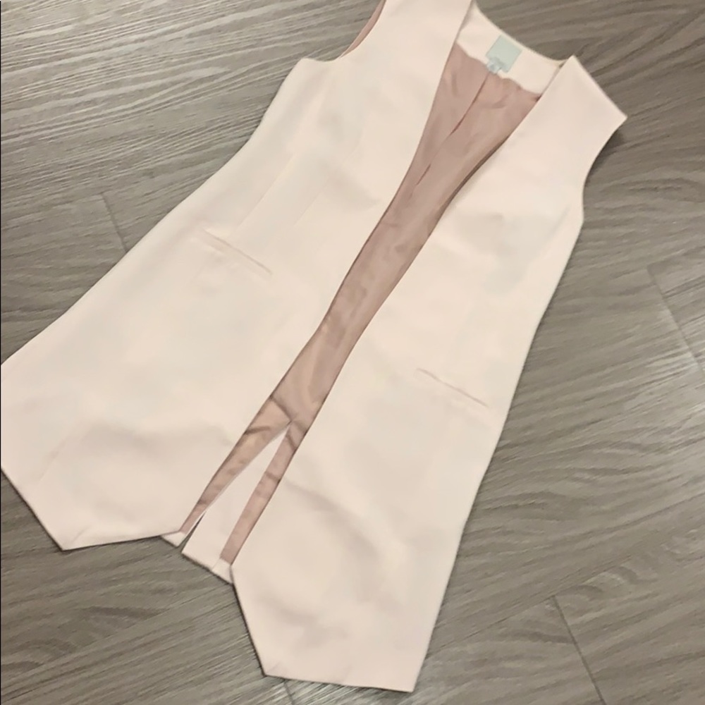 Like new! Light pink vest